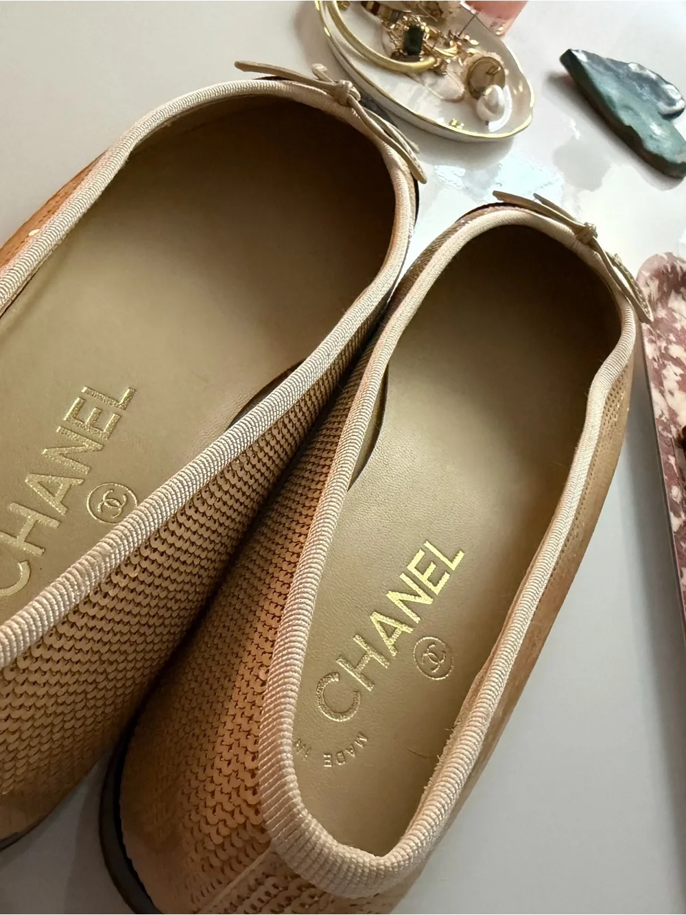 CHANEL Beige and Black Cap-Toe Ballet Flats with Bow
